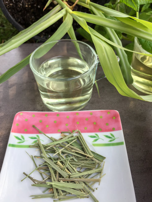 dried lemongrass tea with tea cup